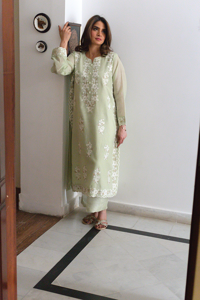 Off white aar and tilla embroidery close-up on semi formal