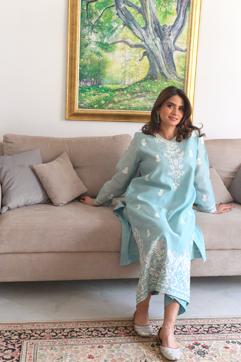 Front view of ice blue embroidered semi formal outfit