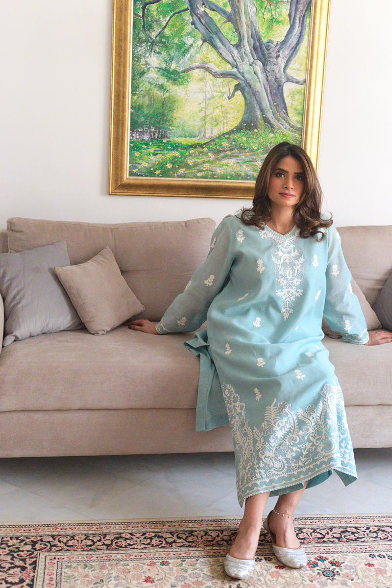Front view of ice blue embroidered semi formal outfit