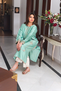 Side view of sage green embroidered semi formal outfit