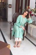 Ivory cutwork izzar pants paired with semi formal kurta