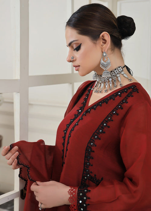 Side view of embroidered semi formals outfit

