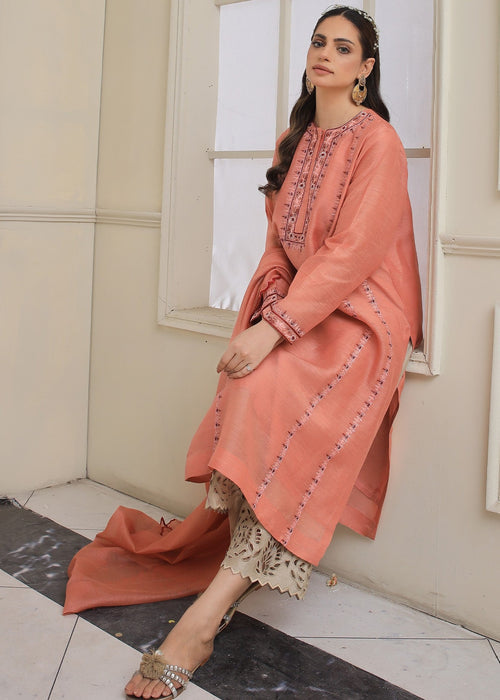 Side view of embroidered semi formal outfit

