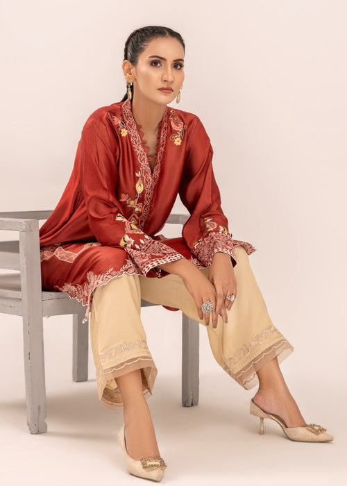 Colorful embroidery on rust semi formal sleeves

