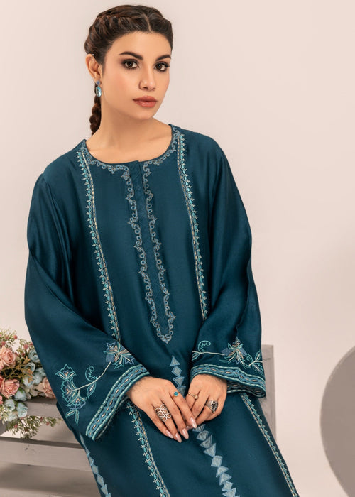 Side view of teal blue embroidered semi formal

