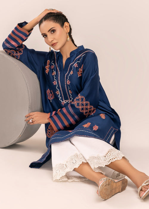 Close-up of sleeves on navy embroidered semi formals

