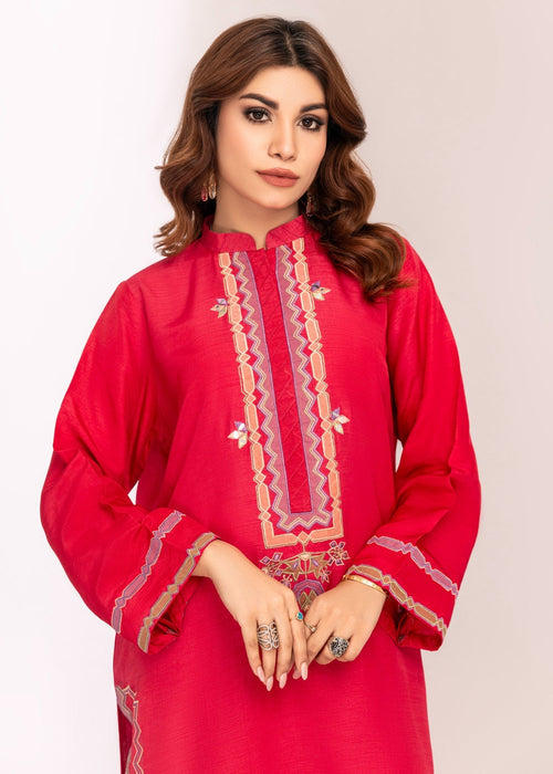 Bold pink semi formal with detailed embroidery

