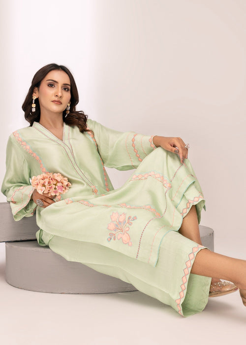 Back view of embroidered semi formal outfit

