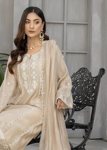 Back view of embroidered semi formals in beige

