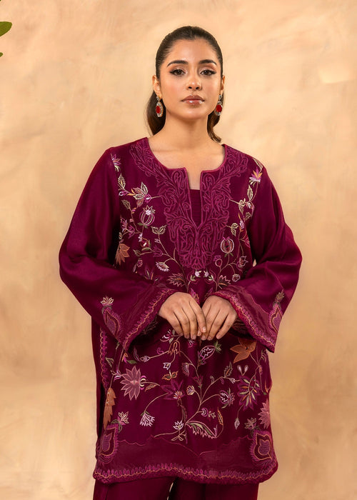 Intricate embroidery on sleeves and neckline

