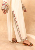 Raw silk izzar pants paired with embroidered kurta

