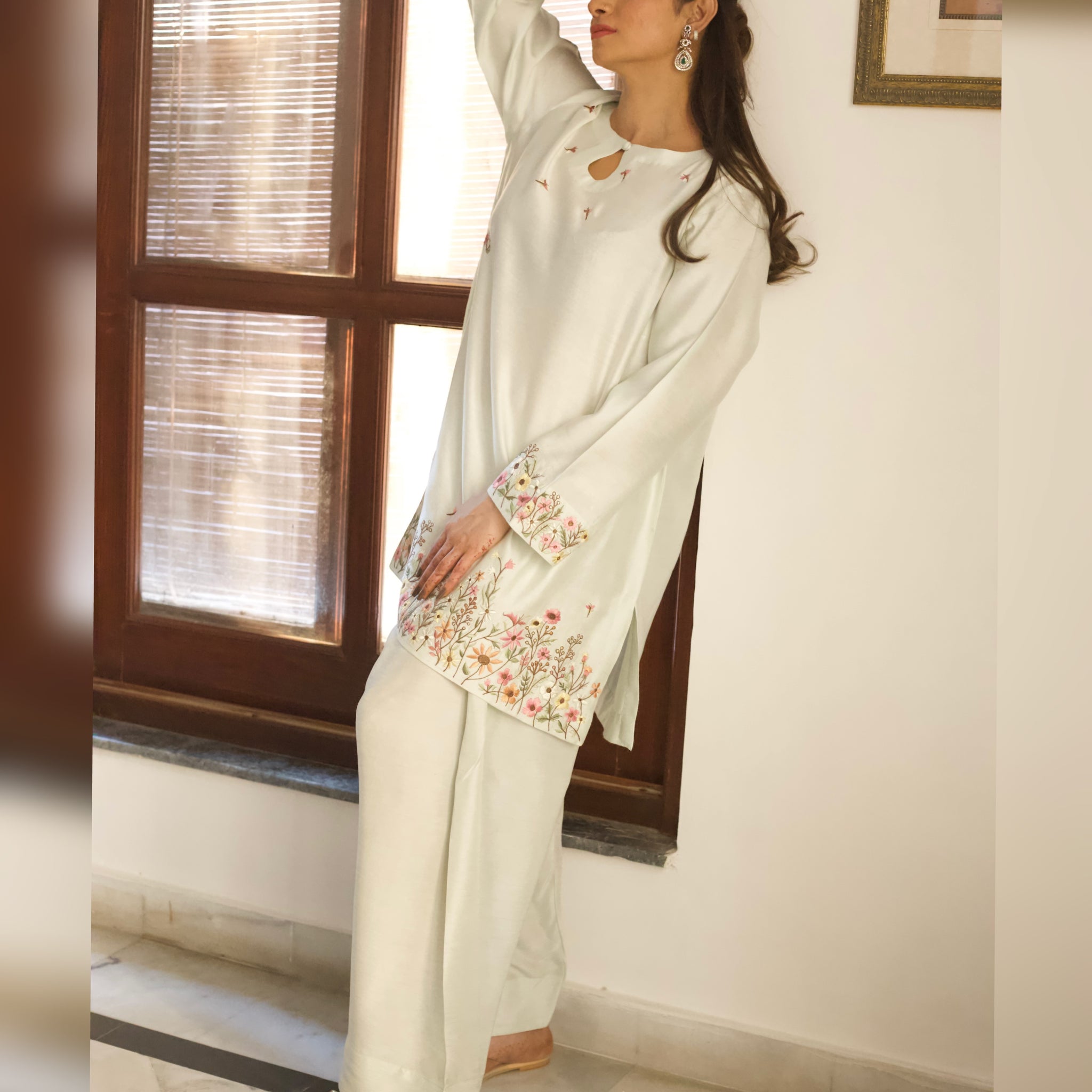 Front view of mint embroidered semi formal outfit

