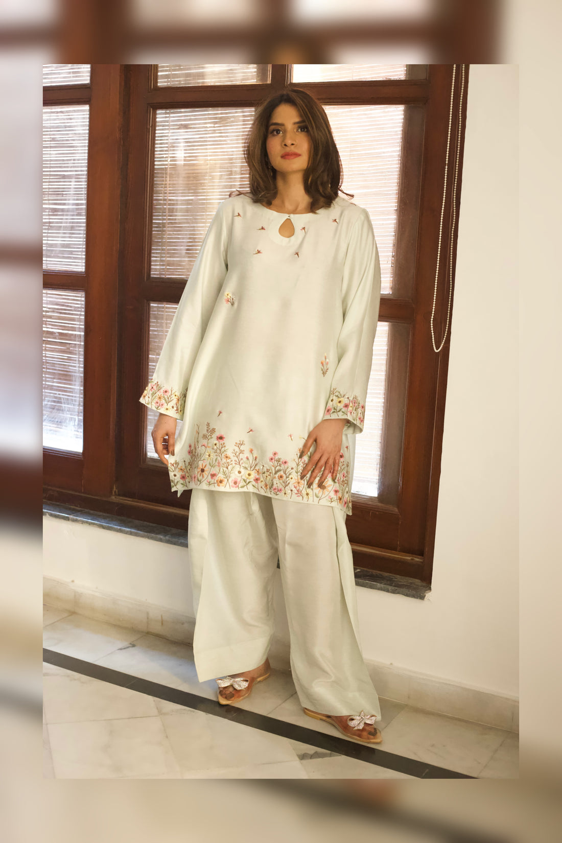 Front view of mint embroidered semi formal outfit


