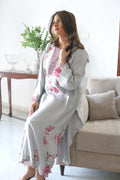 Close-up of neckline embroidery on grey semi formal shirt