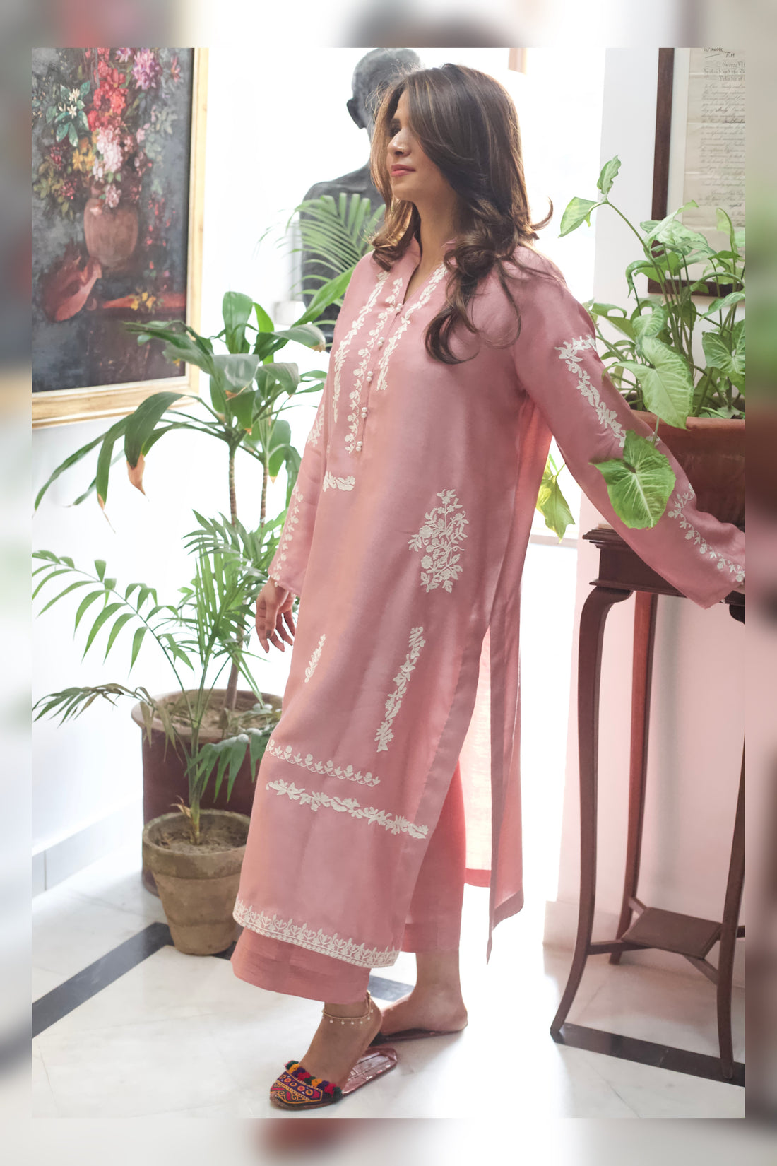 Front view of tea pink embroidered semi formal outfit