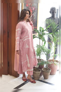 Close-up of off white aar embroidery on pink kurta
